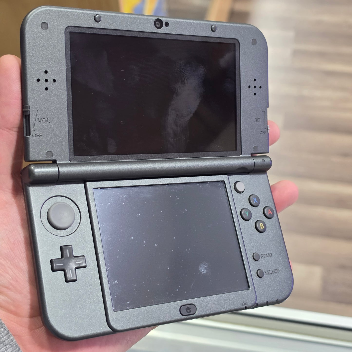 New Nintendo 3DS XL Black Nintendo 3DS Handheld System (Charger included)