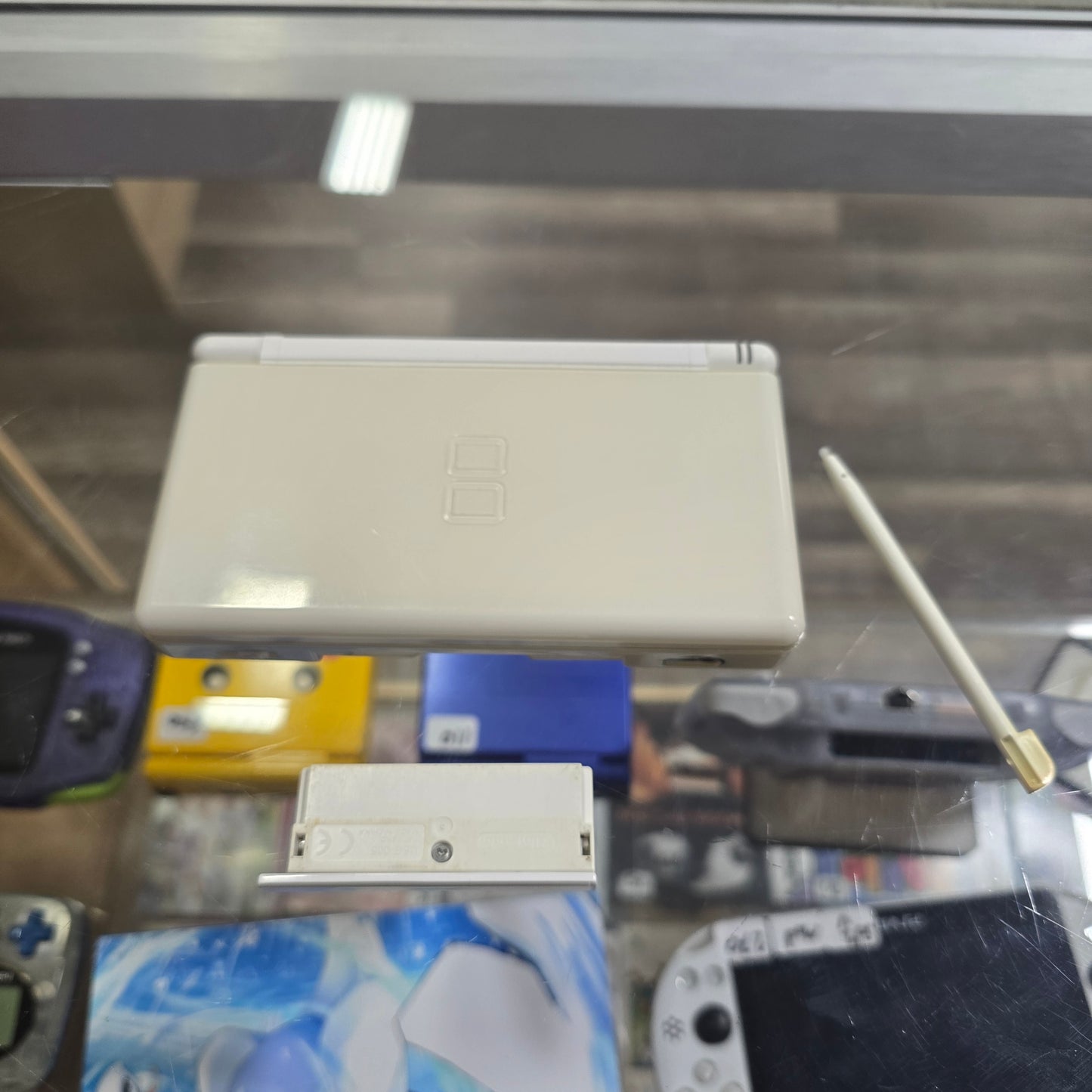 White Nintendo DS Lite Handheld System with Charger (Yellow Screen)