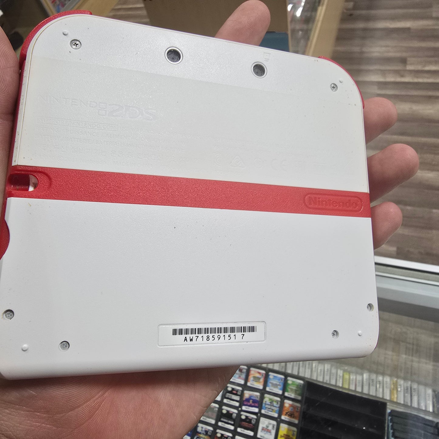 White and Red Nintendo 2DS Handheld System with Charger