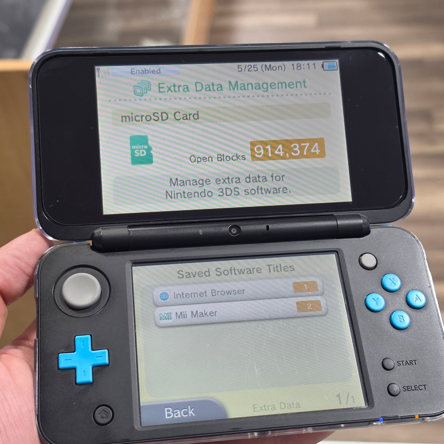 New Nintendo 2DS XL Black + Turquoise Handheld System with Charger (Digital Games)
