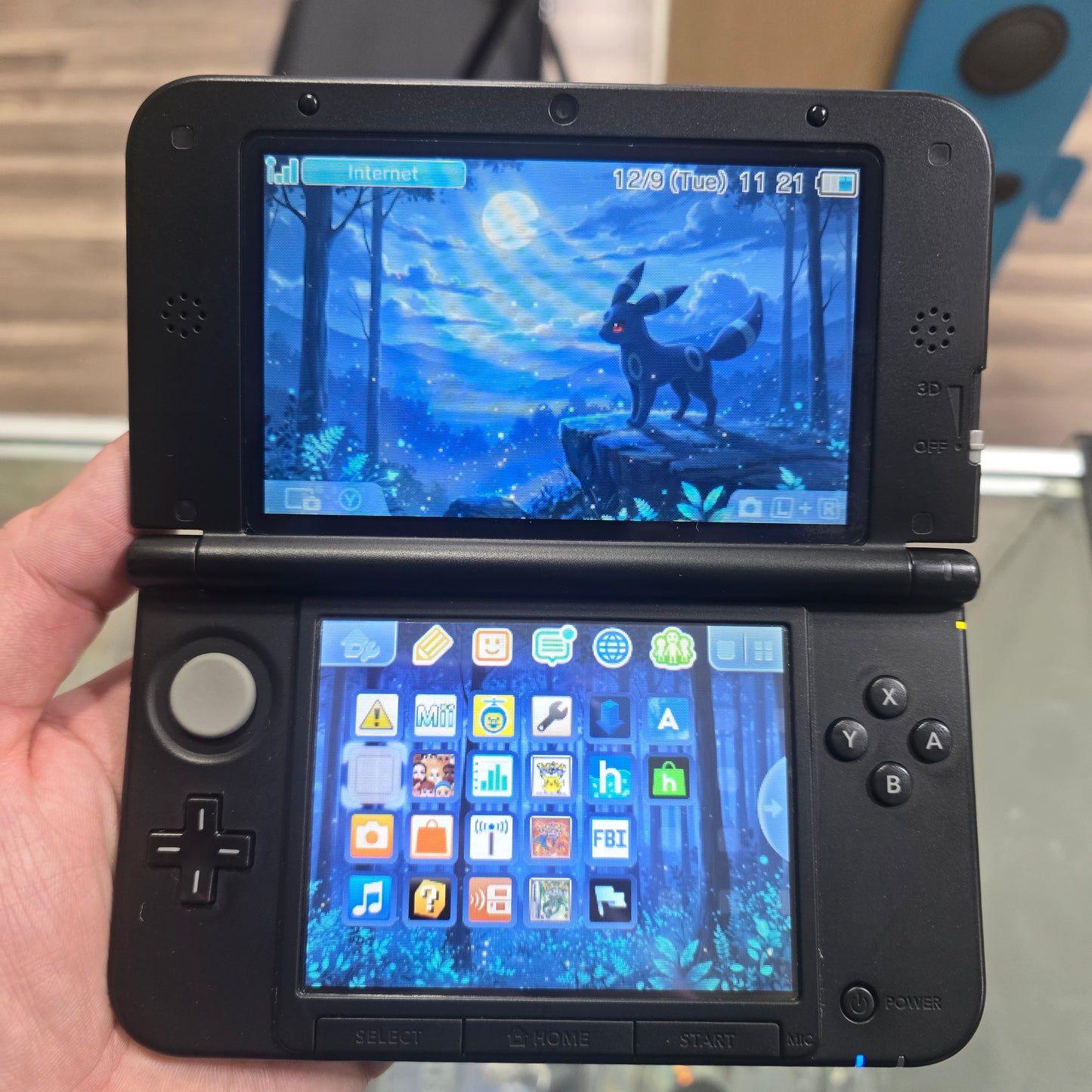 Black Nintendo 3DS LL Handheld System (US Region) with Digital Games (Umbreon)