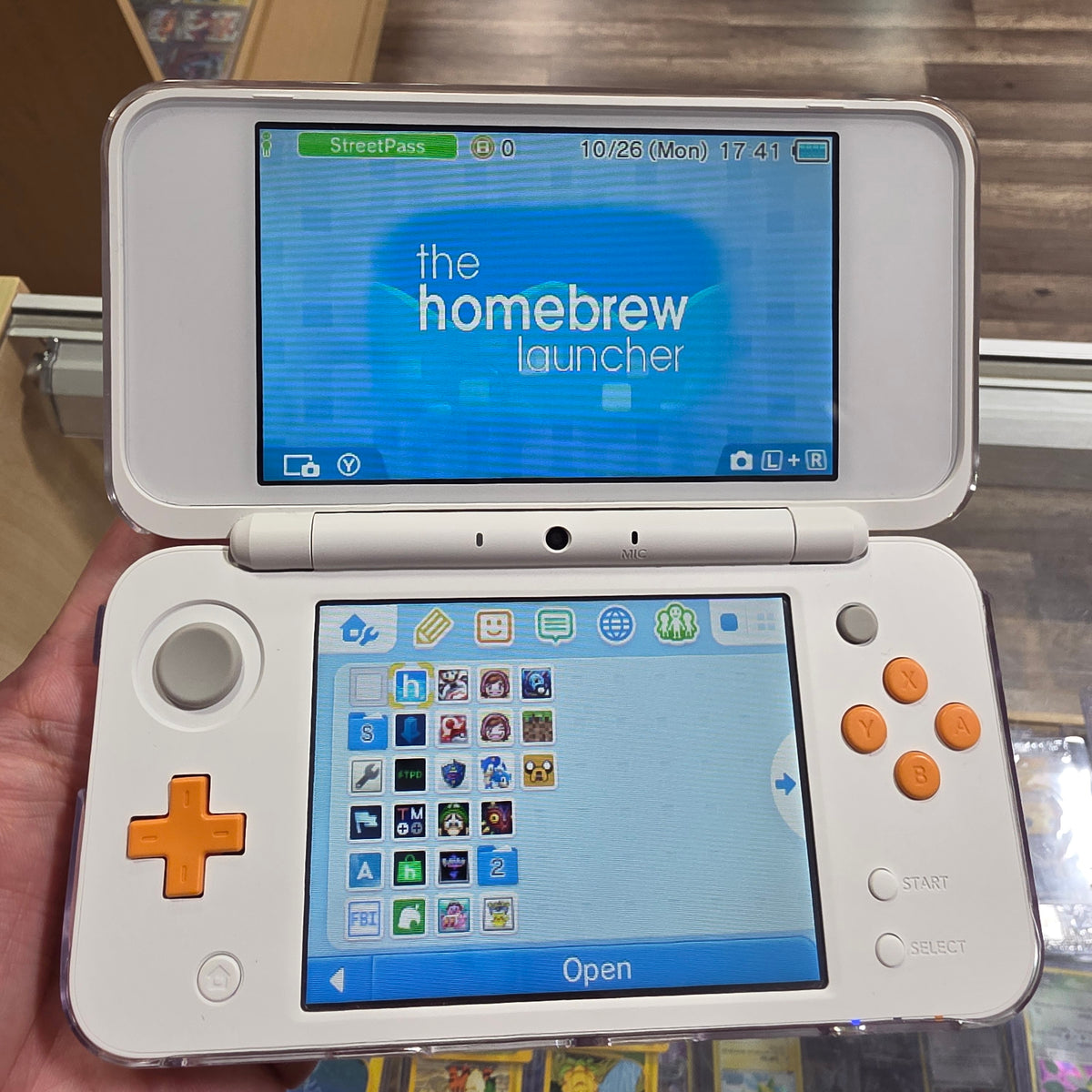 New Nintendo 2DS XL White + Orange Handheld System with Charger (DIGITAL GAMES)