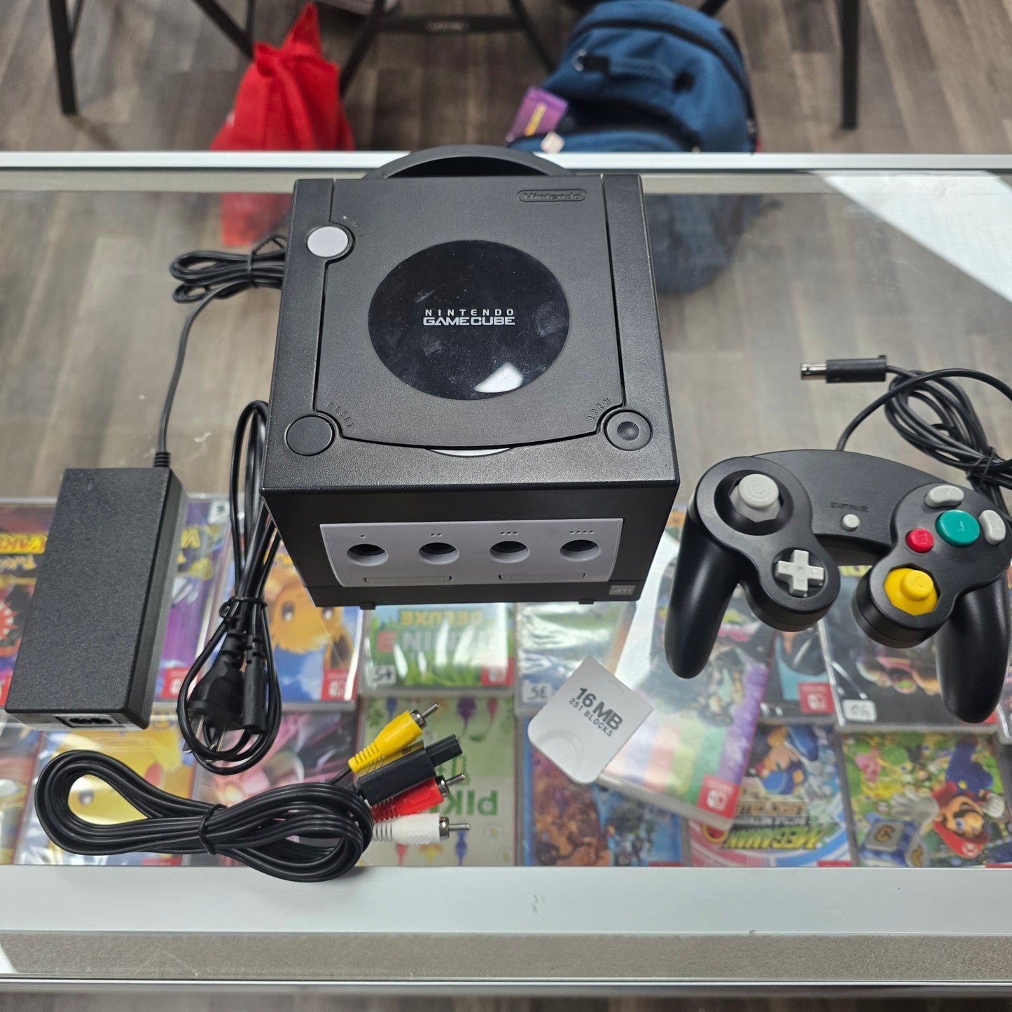 Black Nintendo GameCube System with Controller and Wires