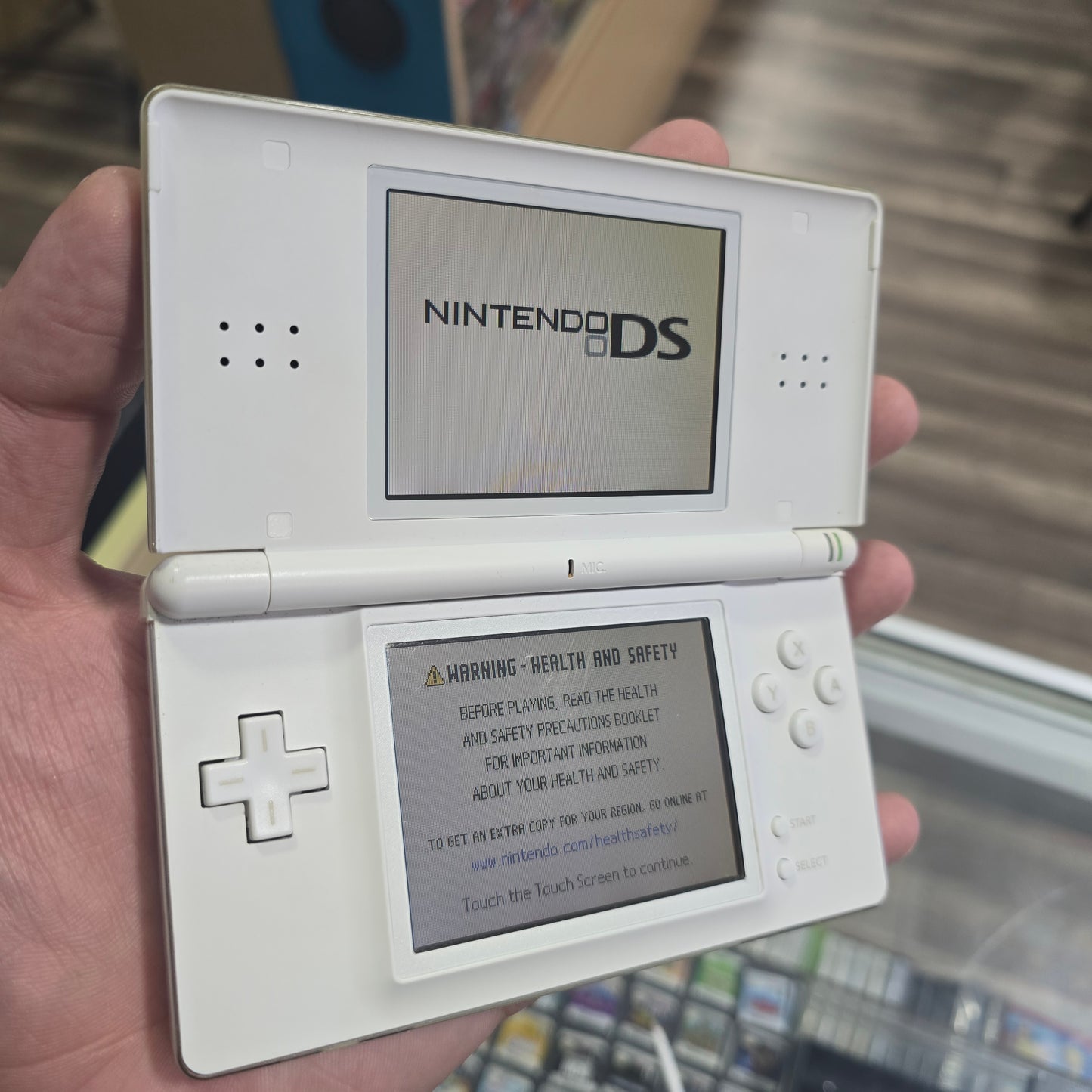 White Nintendo DS Lite Handheld System with Charger