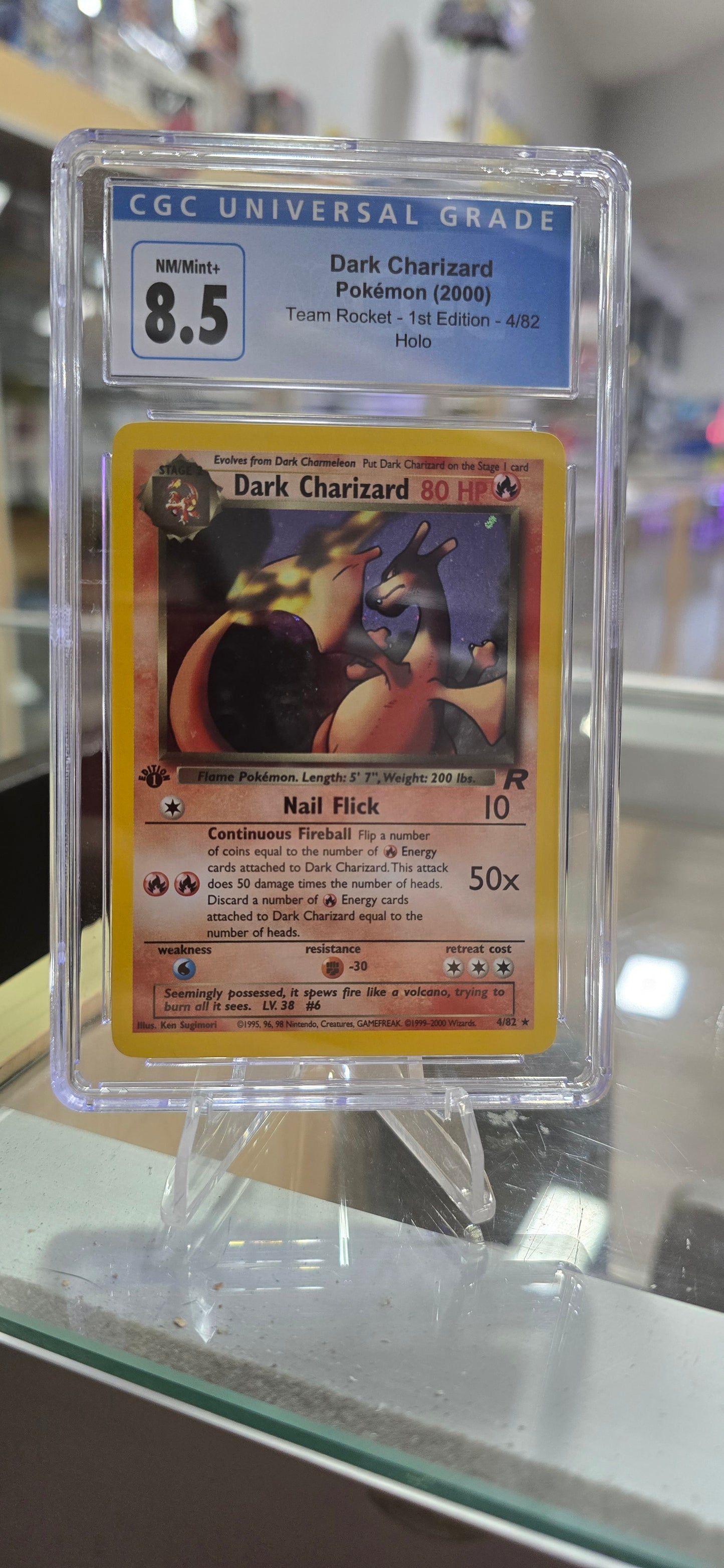 Dark Charizard (4) - Team Rocket (1st Edition) CGC 8.5