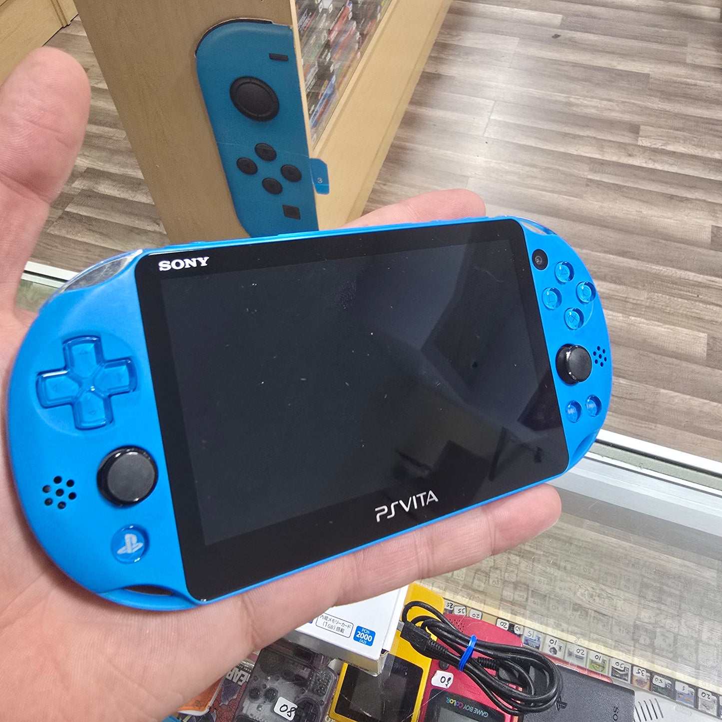 PlayStation Vita Slim Aqua Blue Console Playstation Vita 2000 (with digital games)