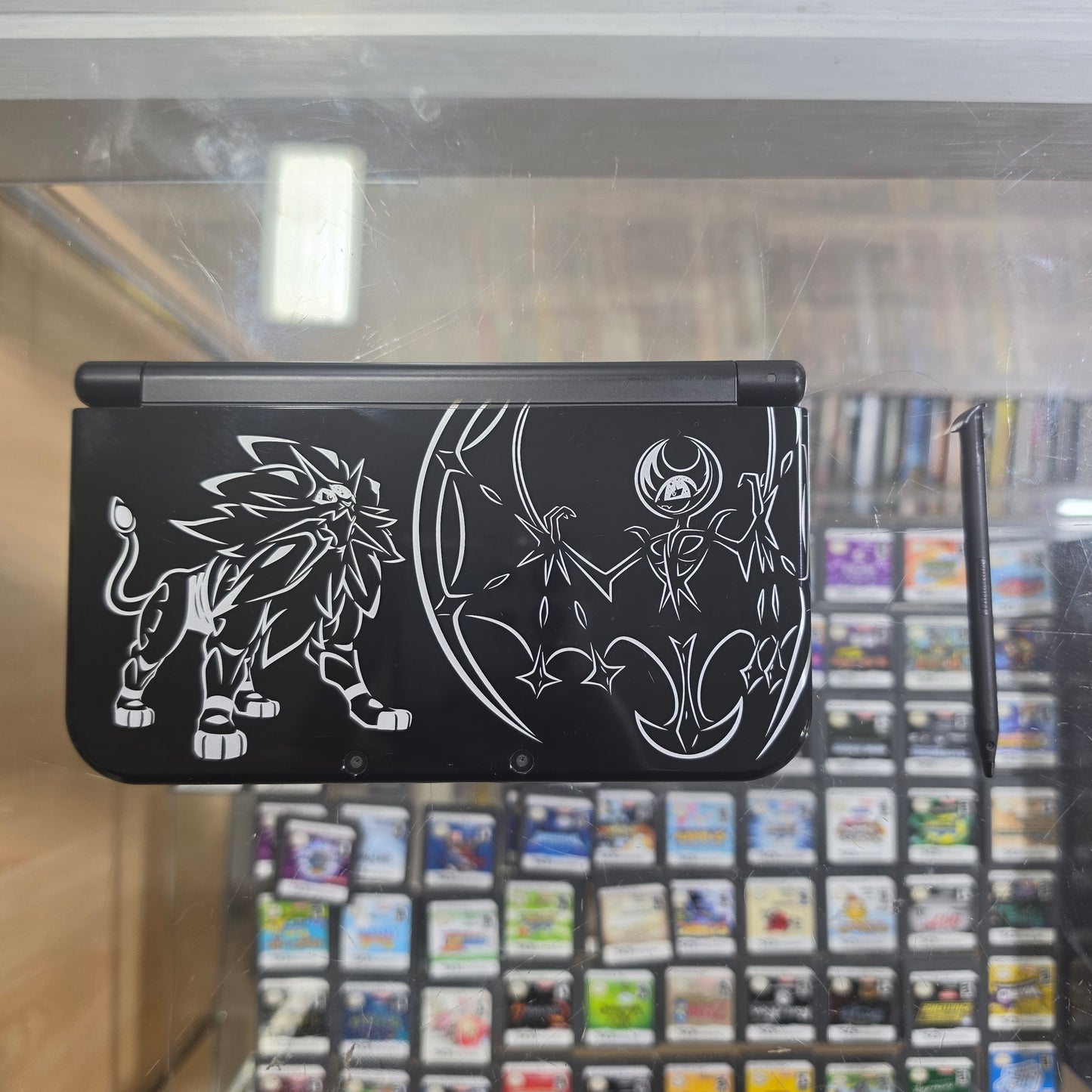 New Nintendo 3DS XL Solgaleo Lunala Black Edition Handheld System with Charger (Digital Games)