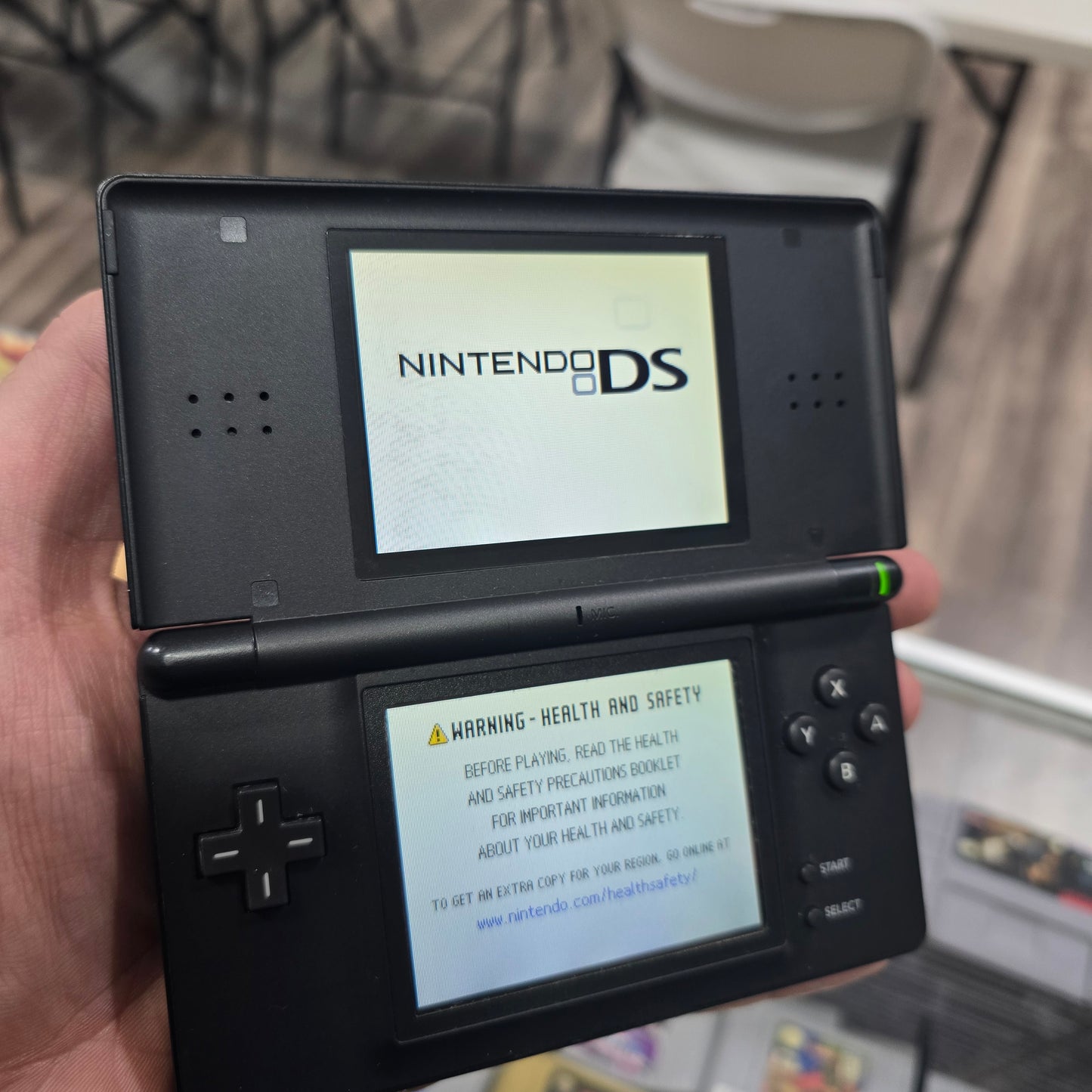 Black Nintendo DS Lite Handheld System with Charger (Has Loose Hinge)