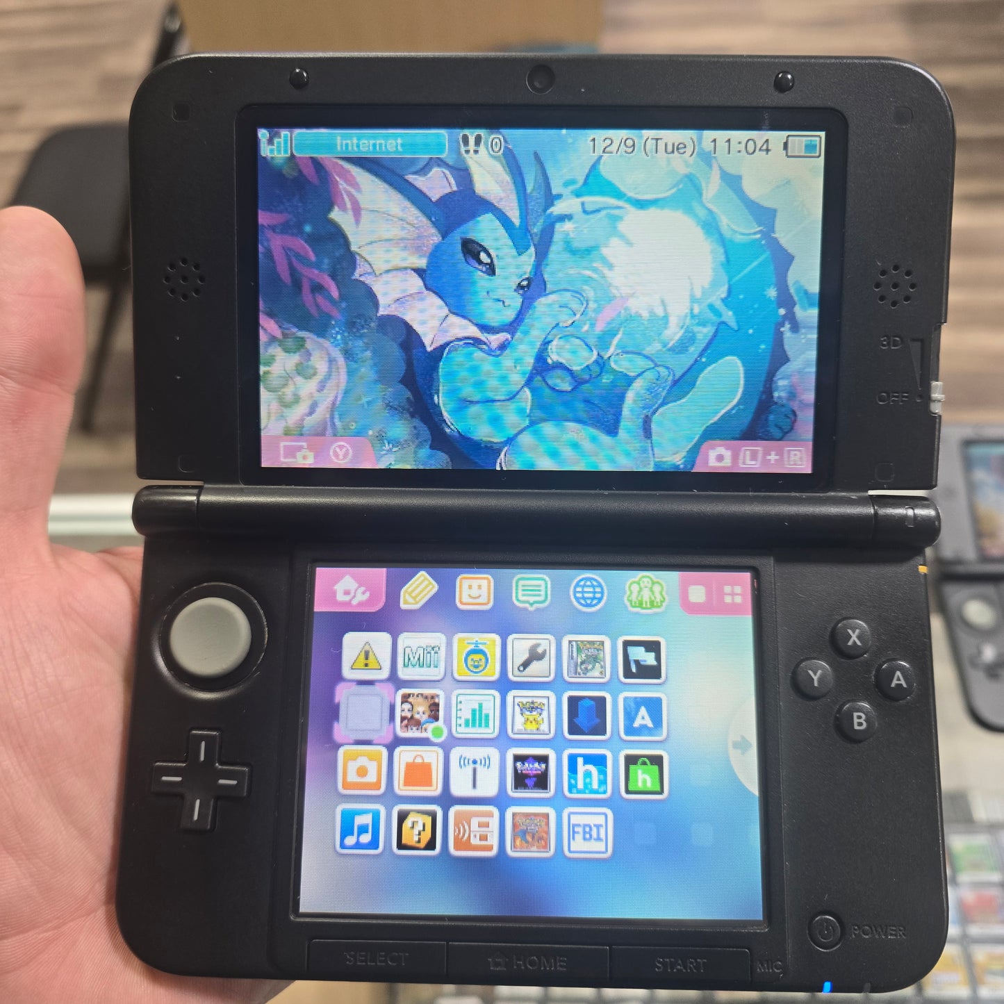 Blue Nintendo 3DS LL Handheld System (US Region) with Digital Games (Vaporeon)