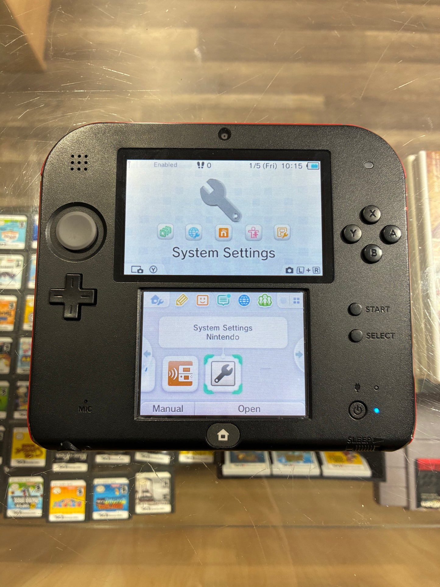 Black and Red Nintendo 2DS Handheld System with Charger