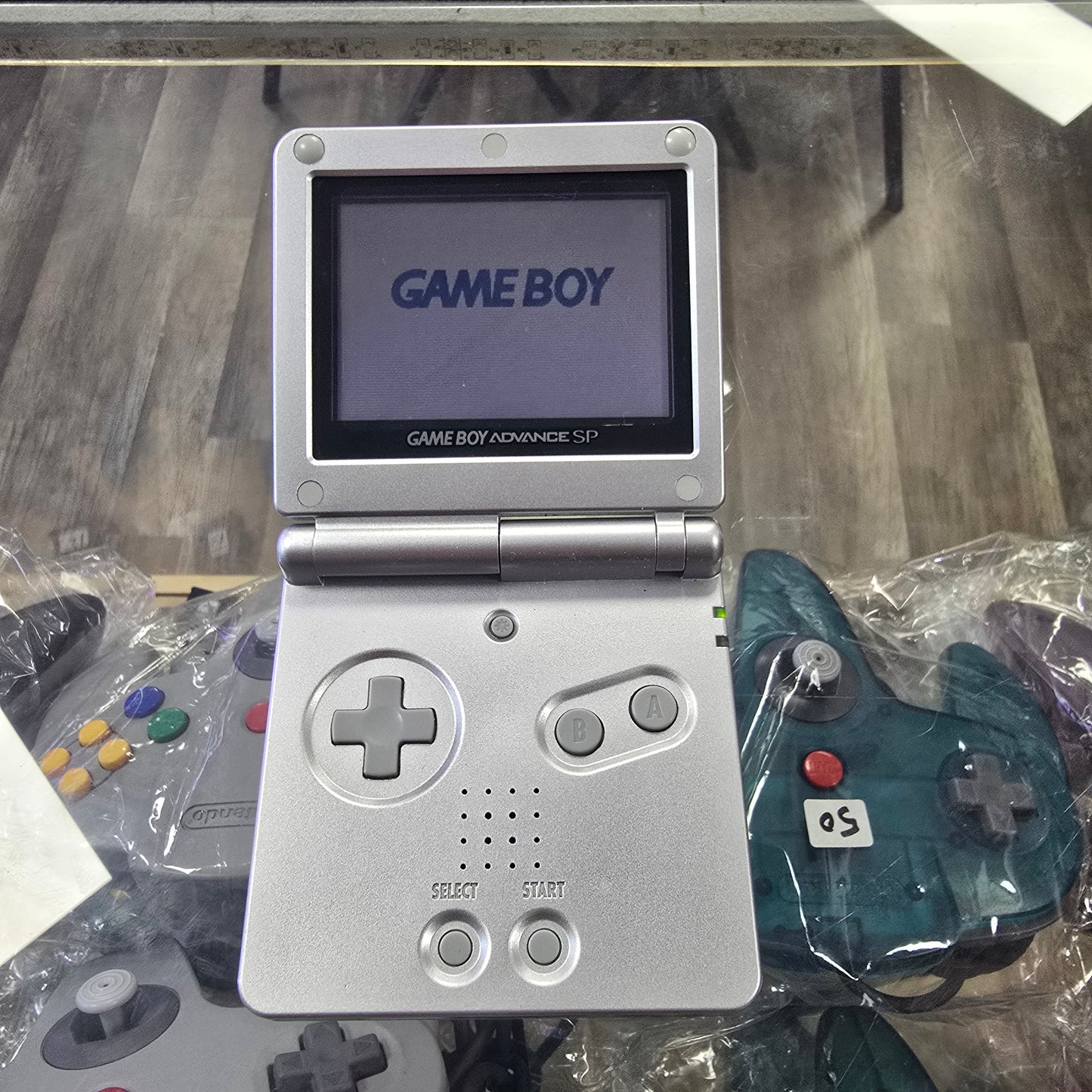 Silver Nintendo Gameboy Advance SP Handheld with Charger 001 Model