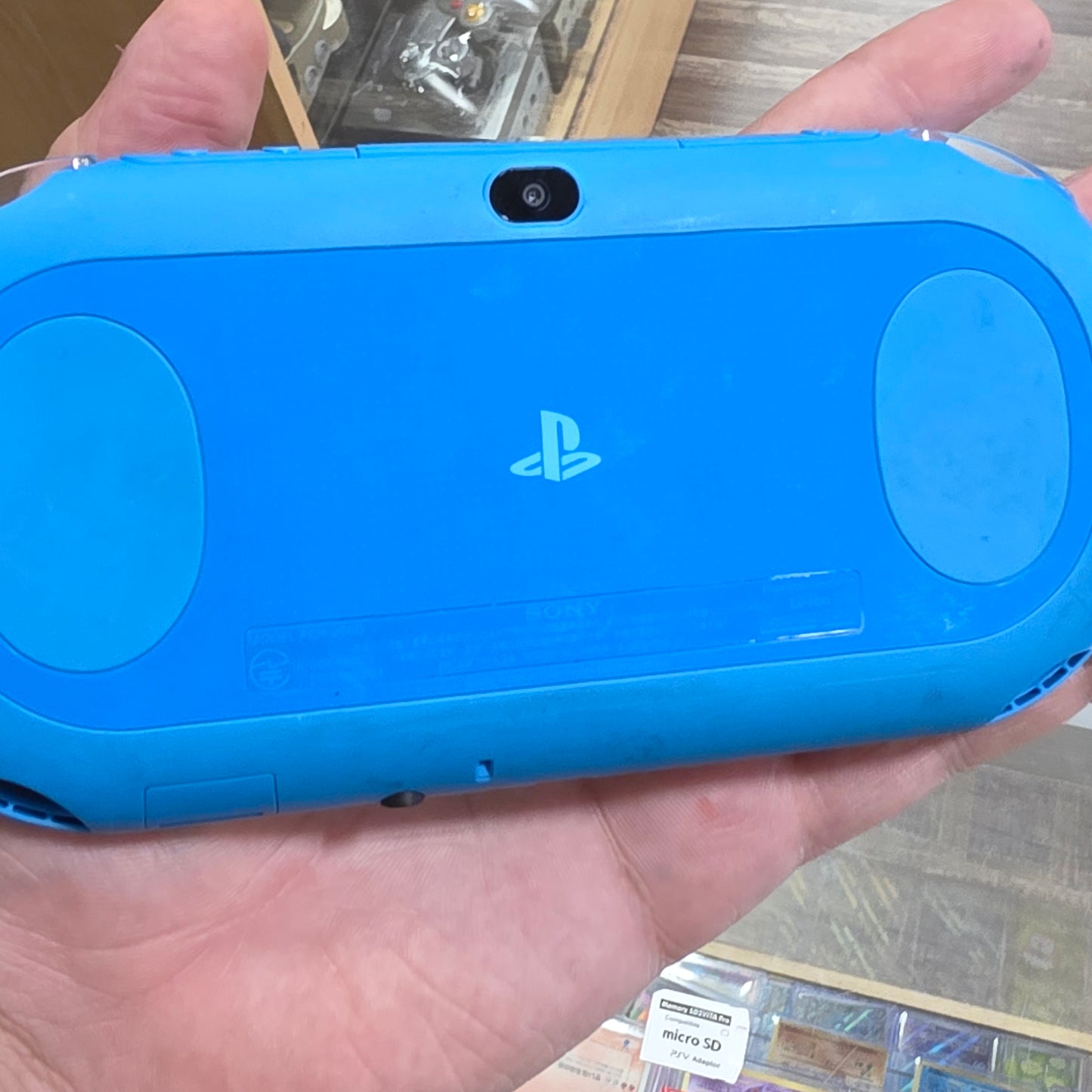 PlayStation Vita Slim Aqua Blue Handheld System with Charger (Has SD to Vita) (Digital Games)
