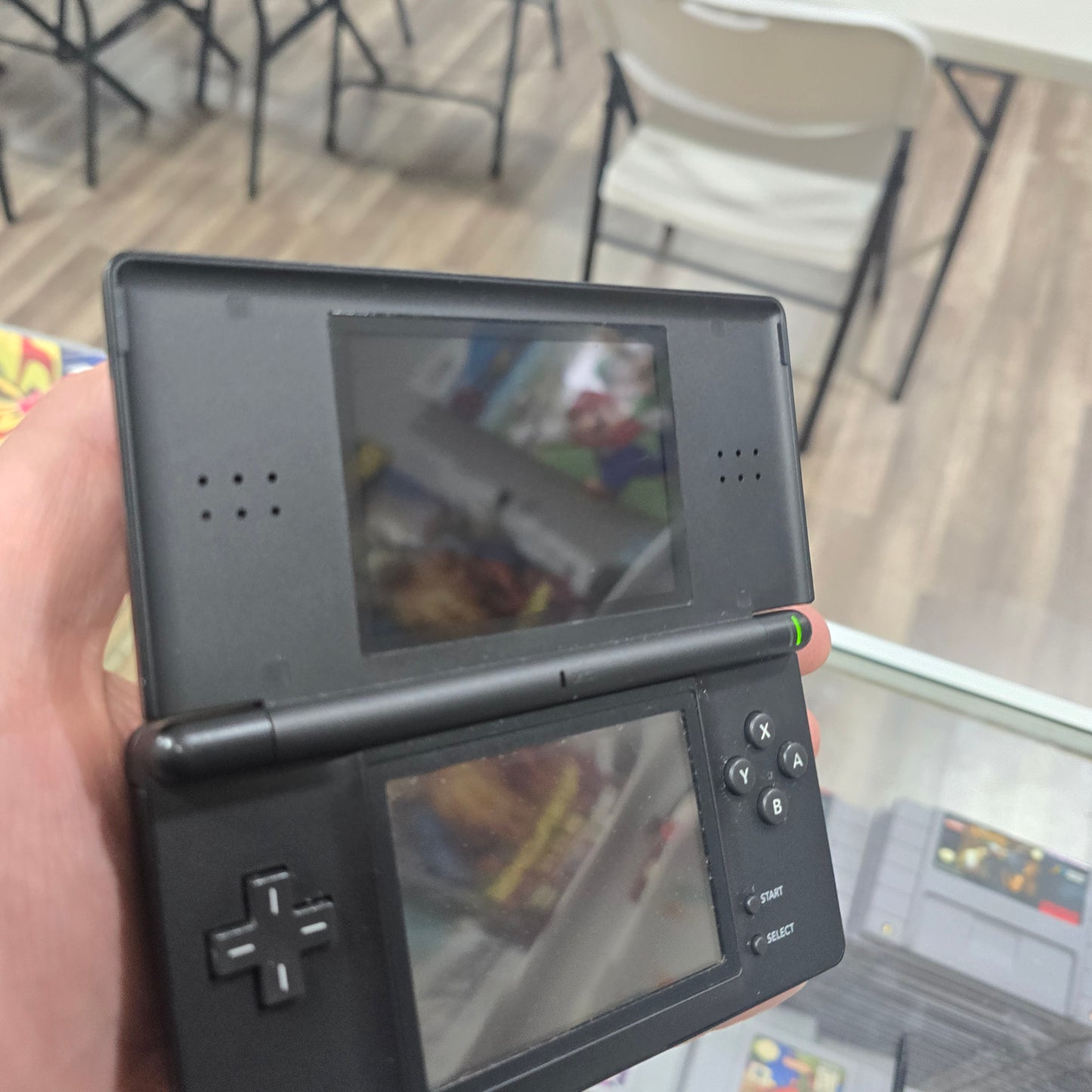 Black Nintendo DS Lite Handheld System with Charger (Has Loose Hinge)