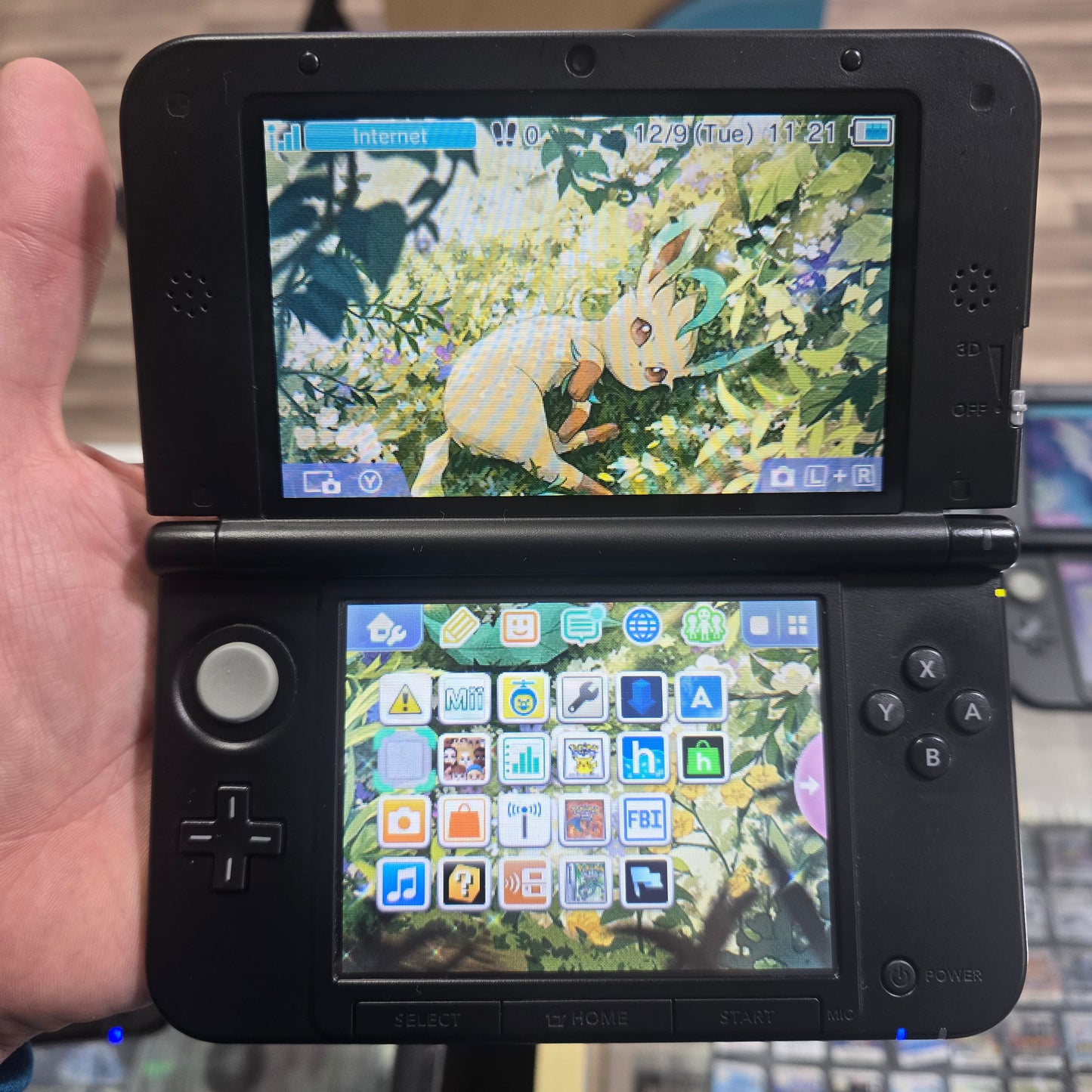 Grey Nintendo 3DS LL Handheld System (US Region) with Digital Games (Leafeon)