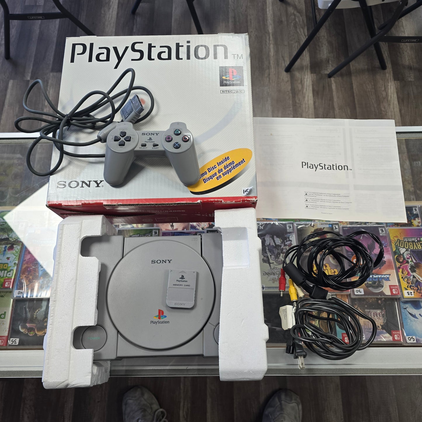 PlayStation 1 System Boxed with controller, wires, and memory card