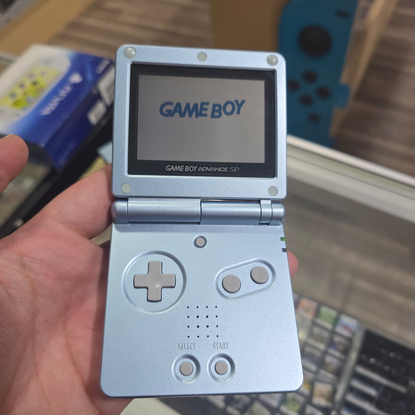 Light Blue Nintendo Gameboy Advance SP Handheld with Charger in Box