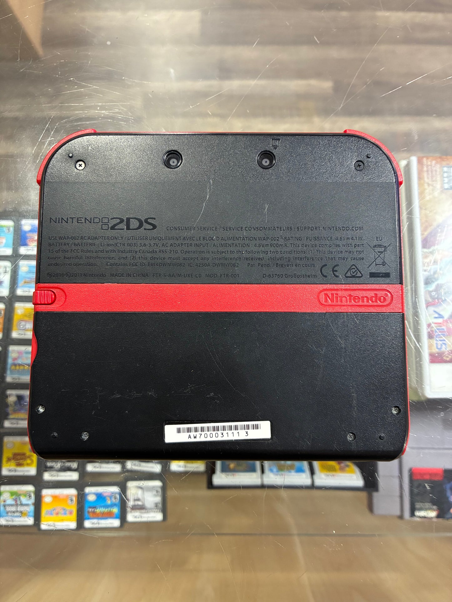 Black and Red Nintendo 2DS Handheld System with Charger
