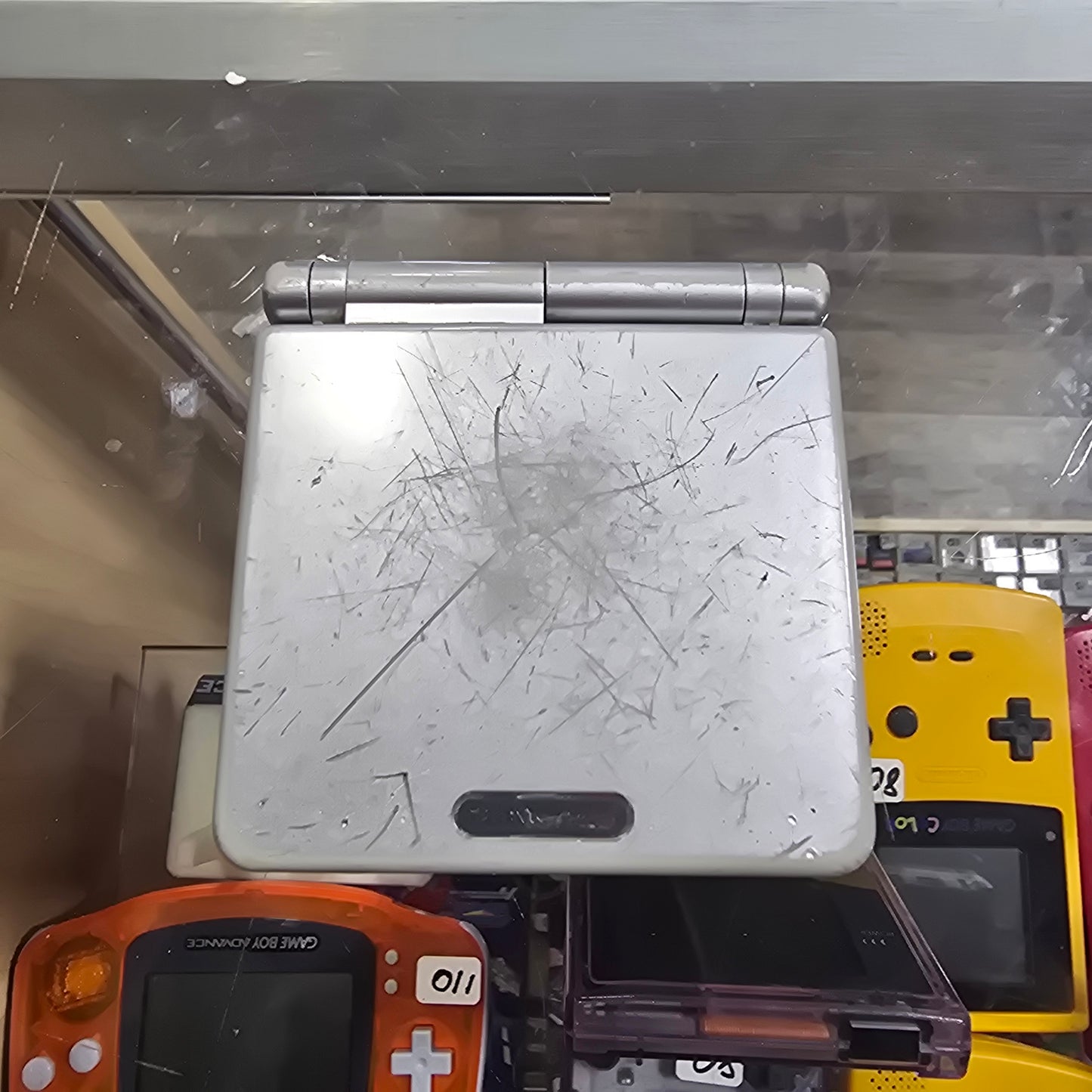 Silver Nintendo Gameboy Advance SP Handheld System with Charger (Rough shell) 001 Model