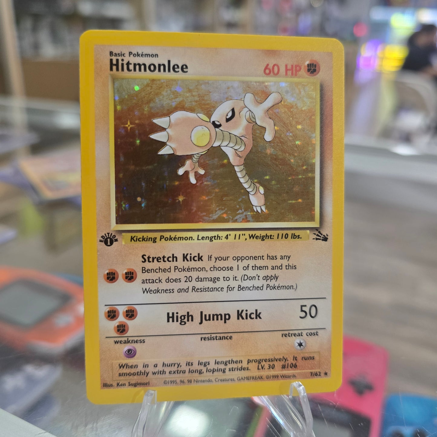Hitmonlee (7) - Fossil 1st Edition (NM)