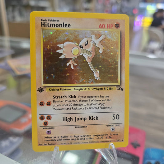 Hitmonlee (7) - Fossil 1st Edition (NM)