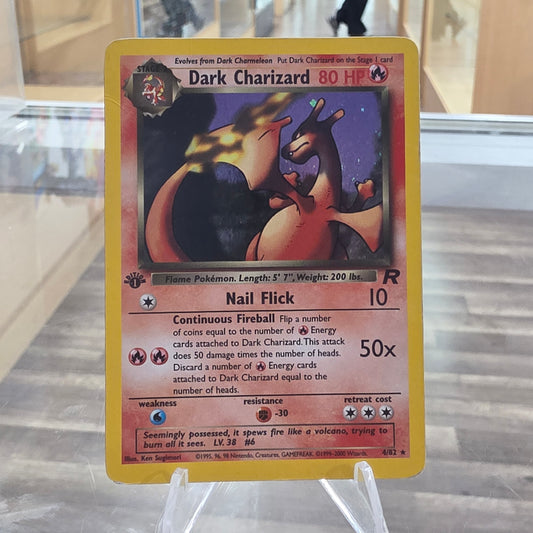 (MP) Dark Charizard (4) - Team Rocket 1st Edition (Swirl)