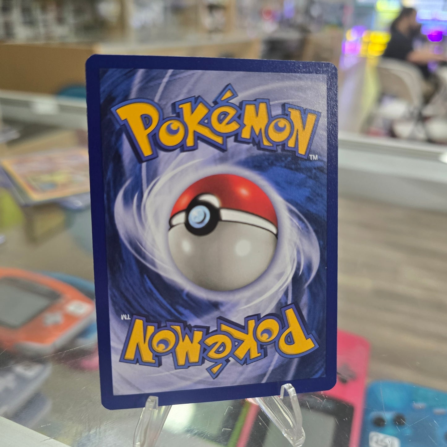 Hitmonlee (7) - Fossil 1st Edition (NM)