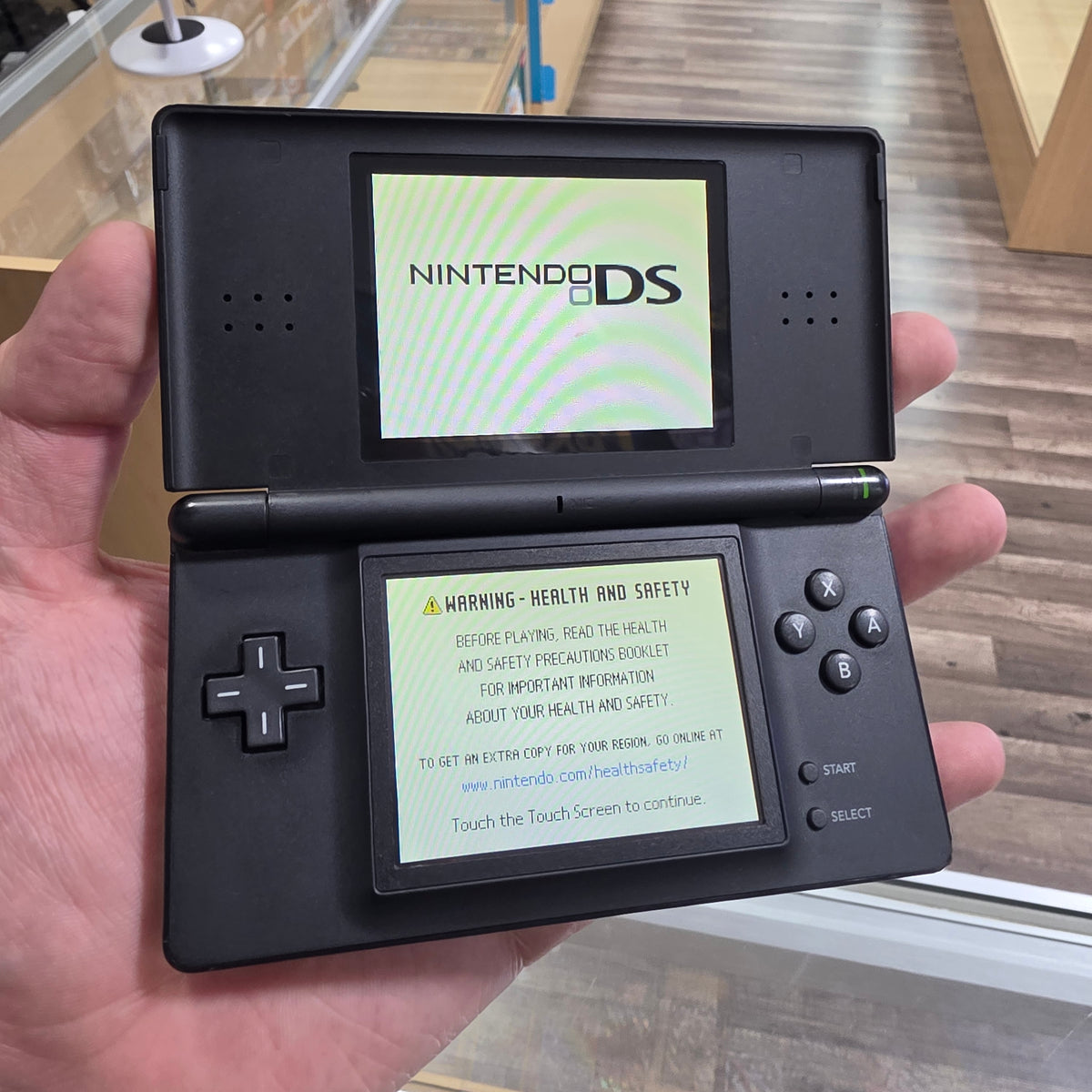 (129) Nintendo DS Lite Handheld System (Black) w/ Charger & Stylus