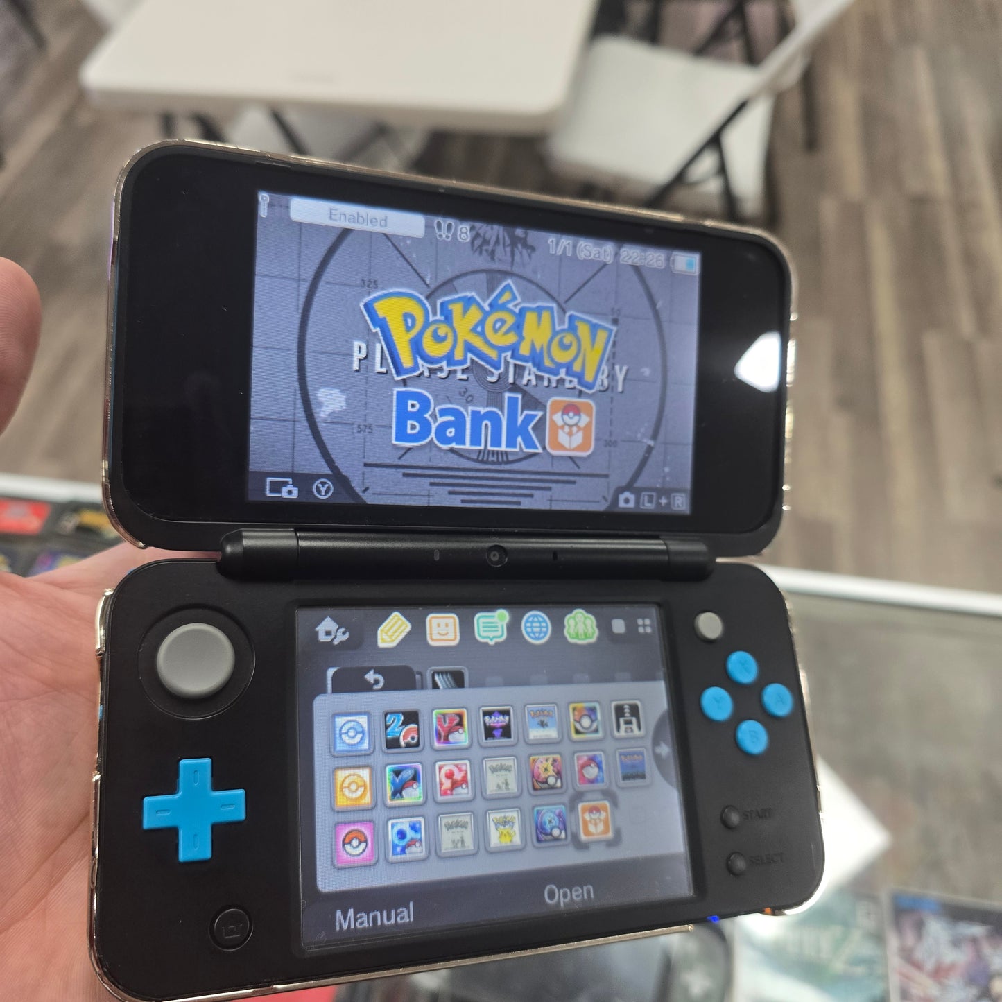 "New" Nintendo 2DS XL Handheld System With Charger and Homebrew Installed with Digital Games (Comes with Pikachu Speical Case Cover)