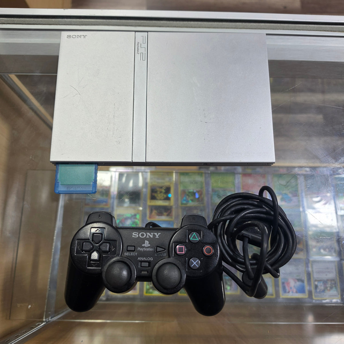 Slim Playstation 2 System [Silver] Comes with all wires, controller, and memory card (320)