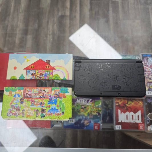 New Nintendo 3DS Super Mario Black Edition Nintendo 3DS Handheld System with Charger and (Animal Crossing Plates)