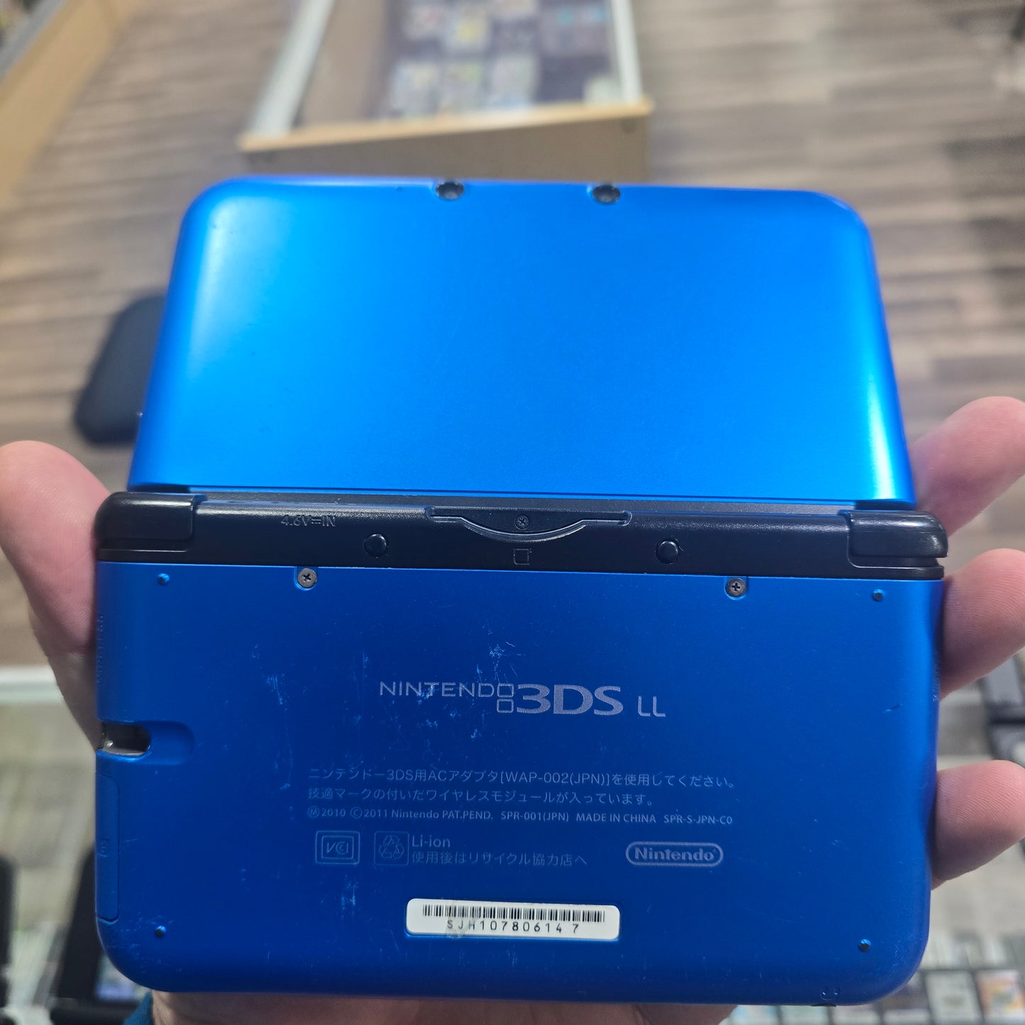 Blue Nintendo 3DS LL Handheld System (US Region) with Digital Games (Vaporeon)