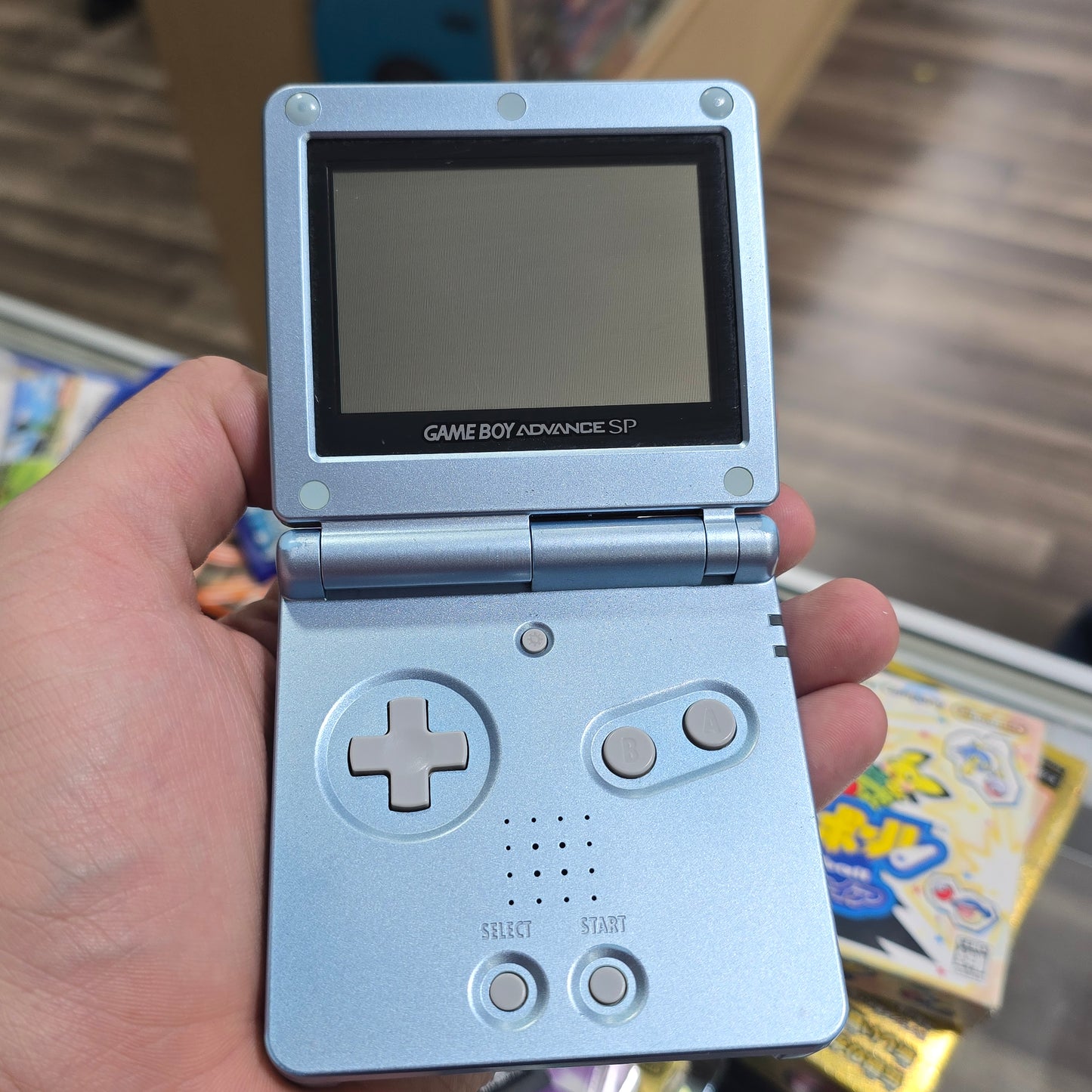 Light Blue Nintendo Gameboy Advance SP Handheld with Charger