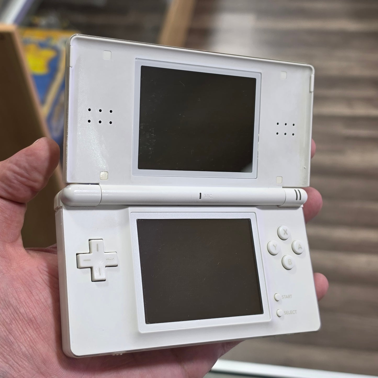 White Nintendo DS Lite Handheld System with Charger