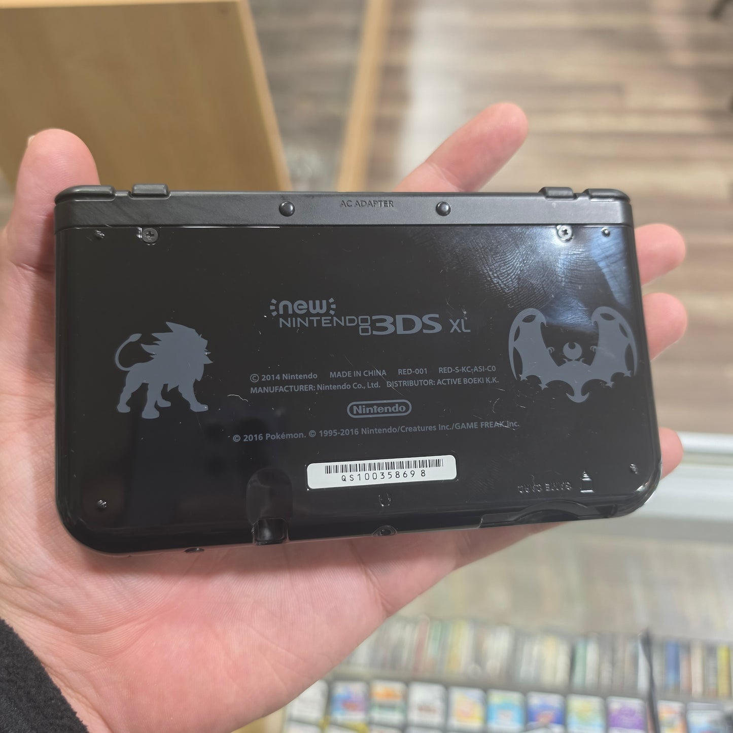 New Nintendo 3DS XL Solgaleo Lunala Black Edition Handheld System with Charger (Digital Games)