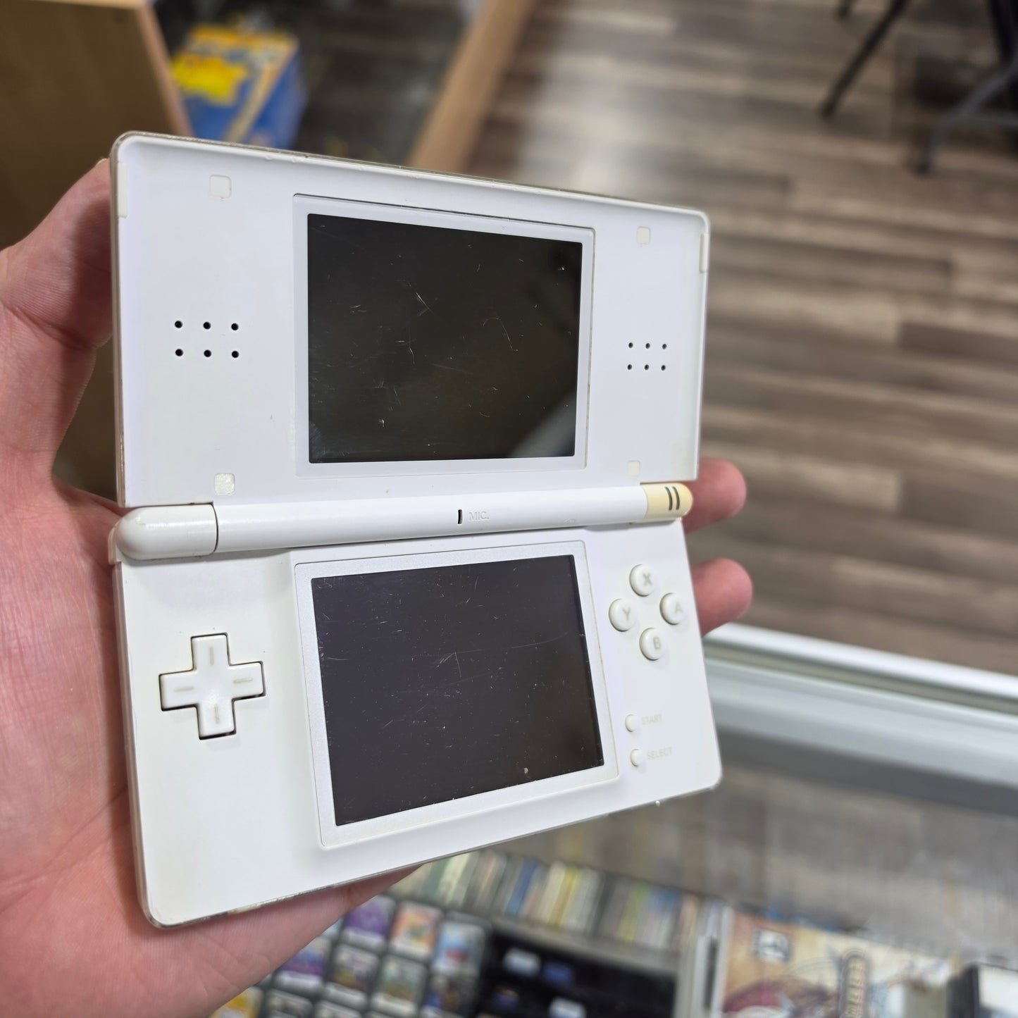 White Nintendo DS Lite Handheld System with Charger