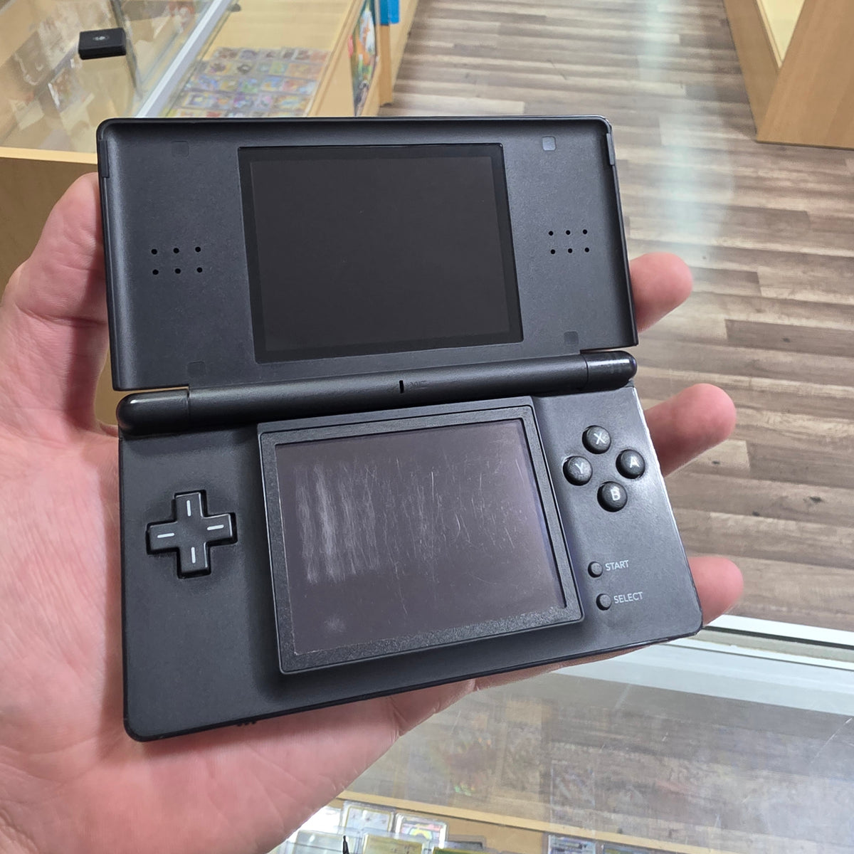 (129) Nintendo DS Lite Handheld System (Black) w/ Charger & Stylus