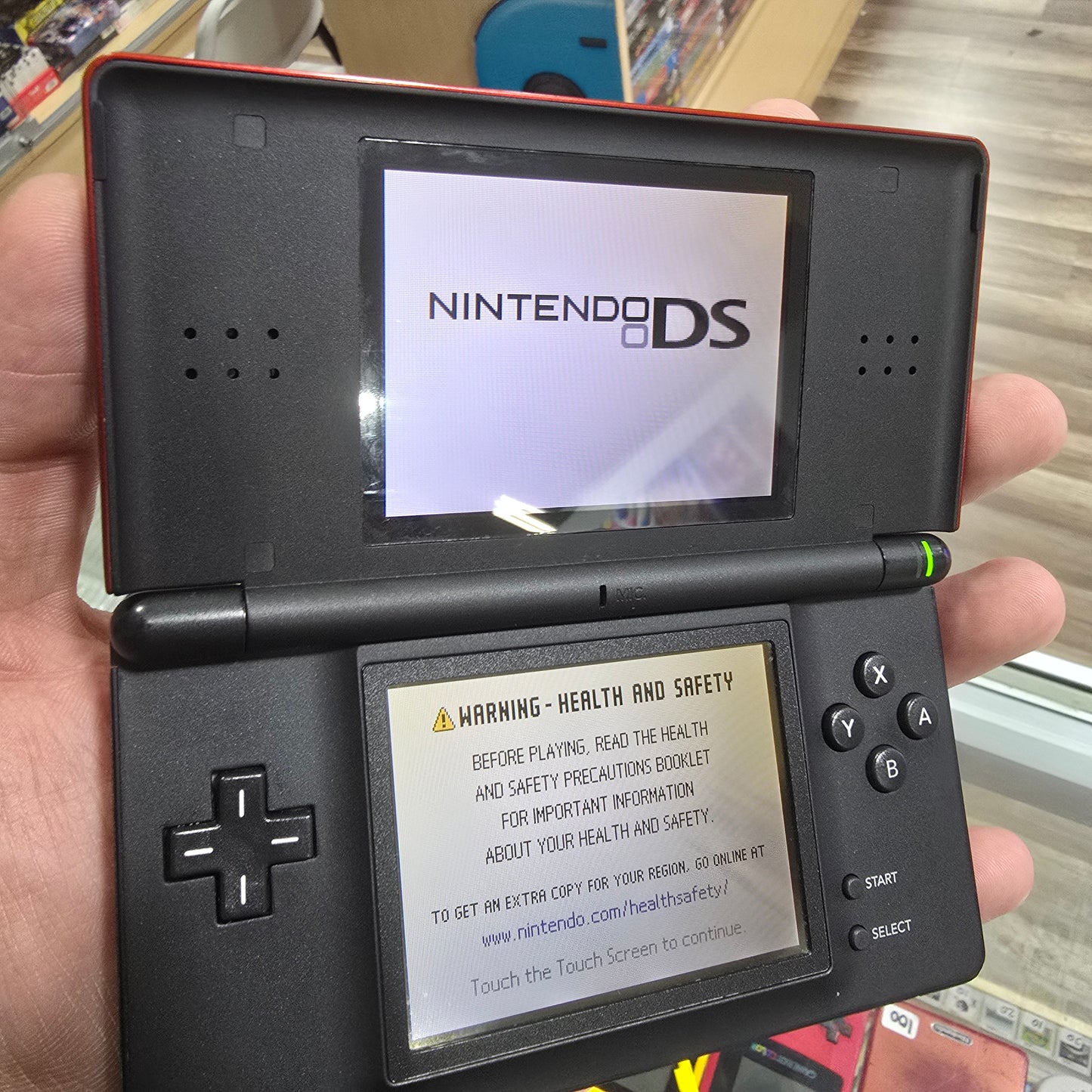 Red Nintendo DS Lite Handheld System with Charger