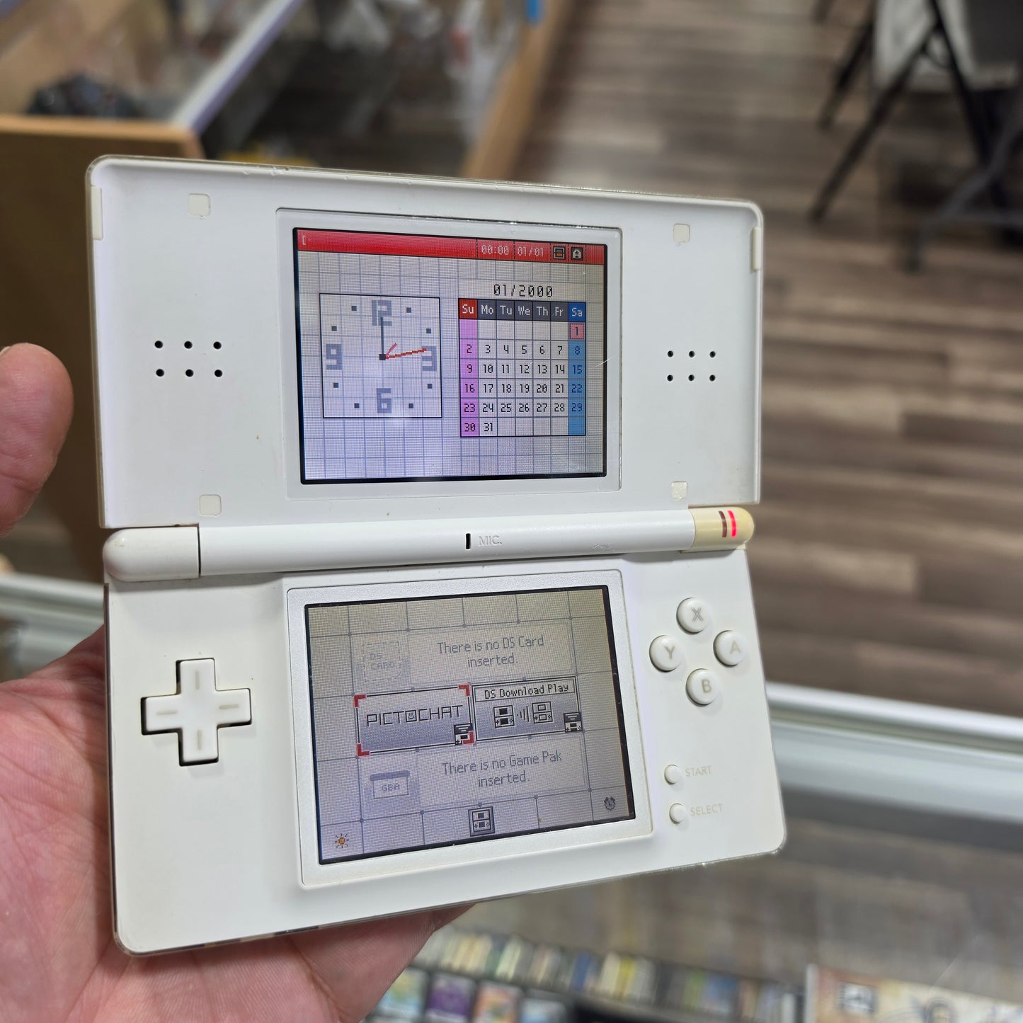 White Nintendo DS Lite Handheld System with Charger