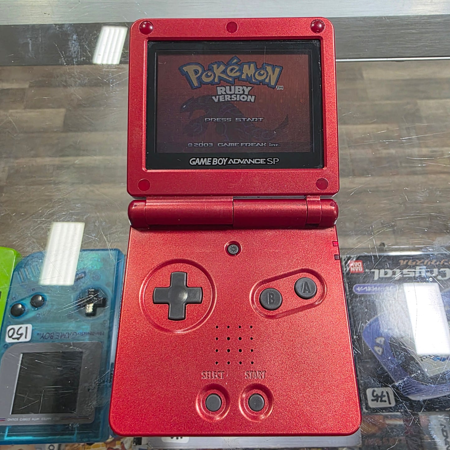 Red Nintendo Gameboy Advance SP (Charger included) [GAME NOT INCLUDED]