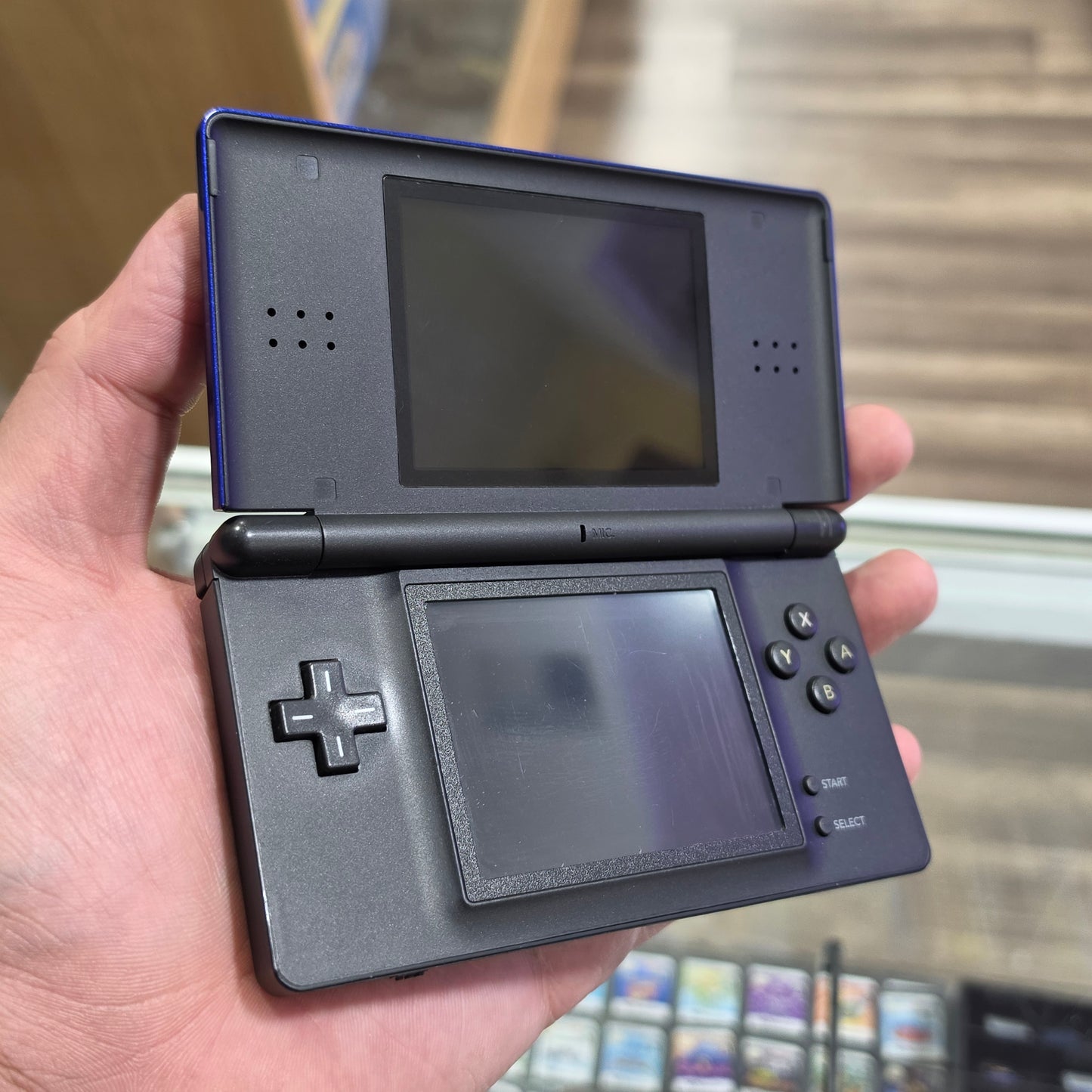 Blue Nintendo DS Lite Handheld System with Charger (Yellowish Bottom Screen)
