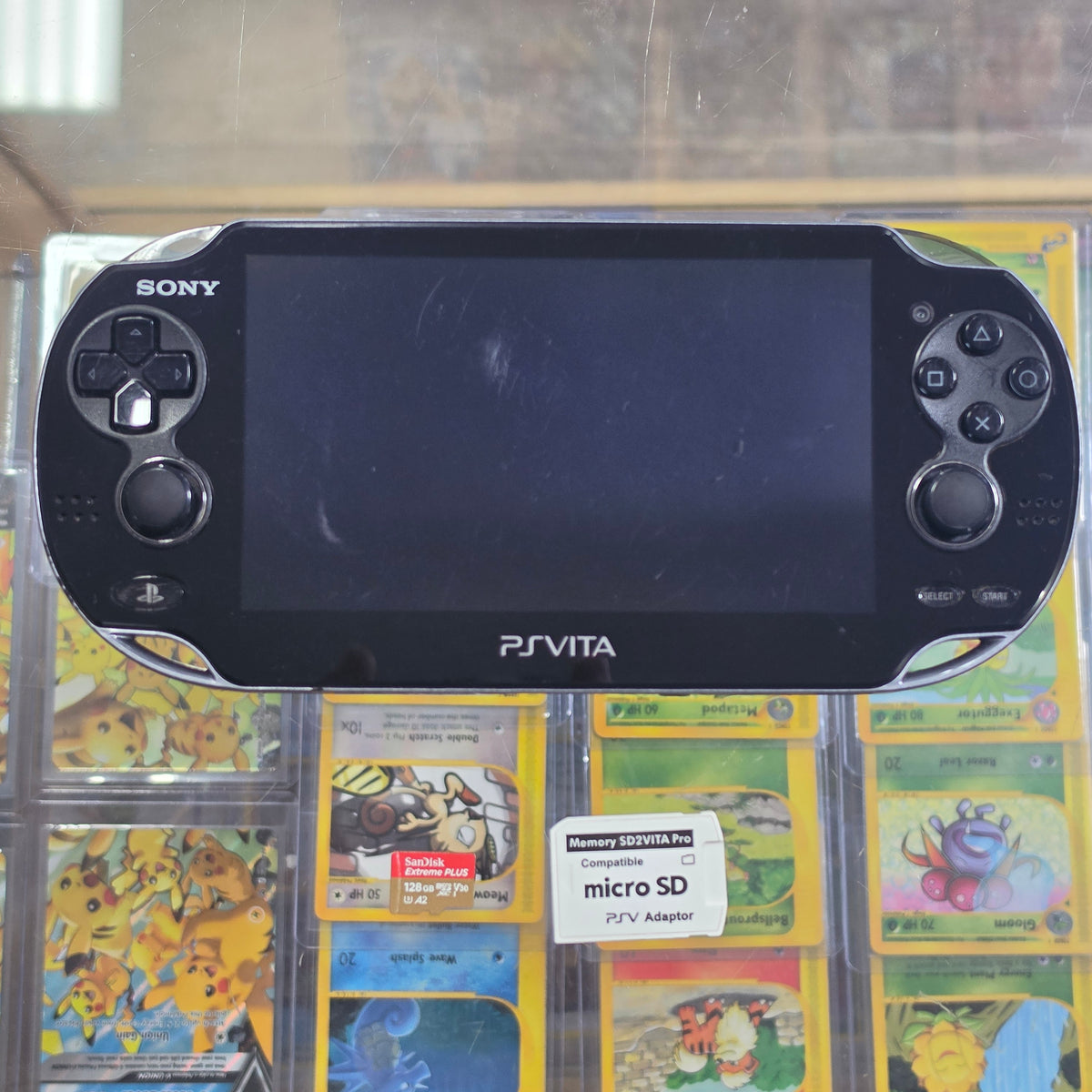 Black Playstation Vita Handheld System with SD2VITA (Charger included)