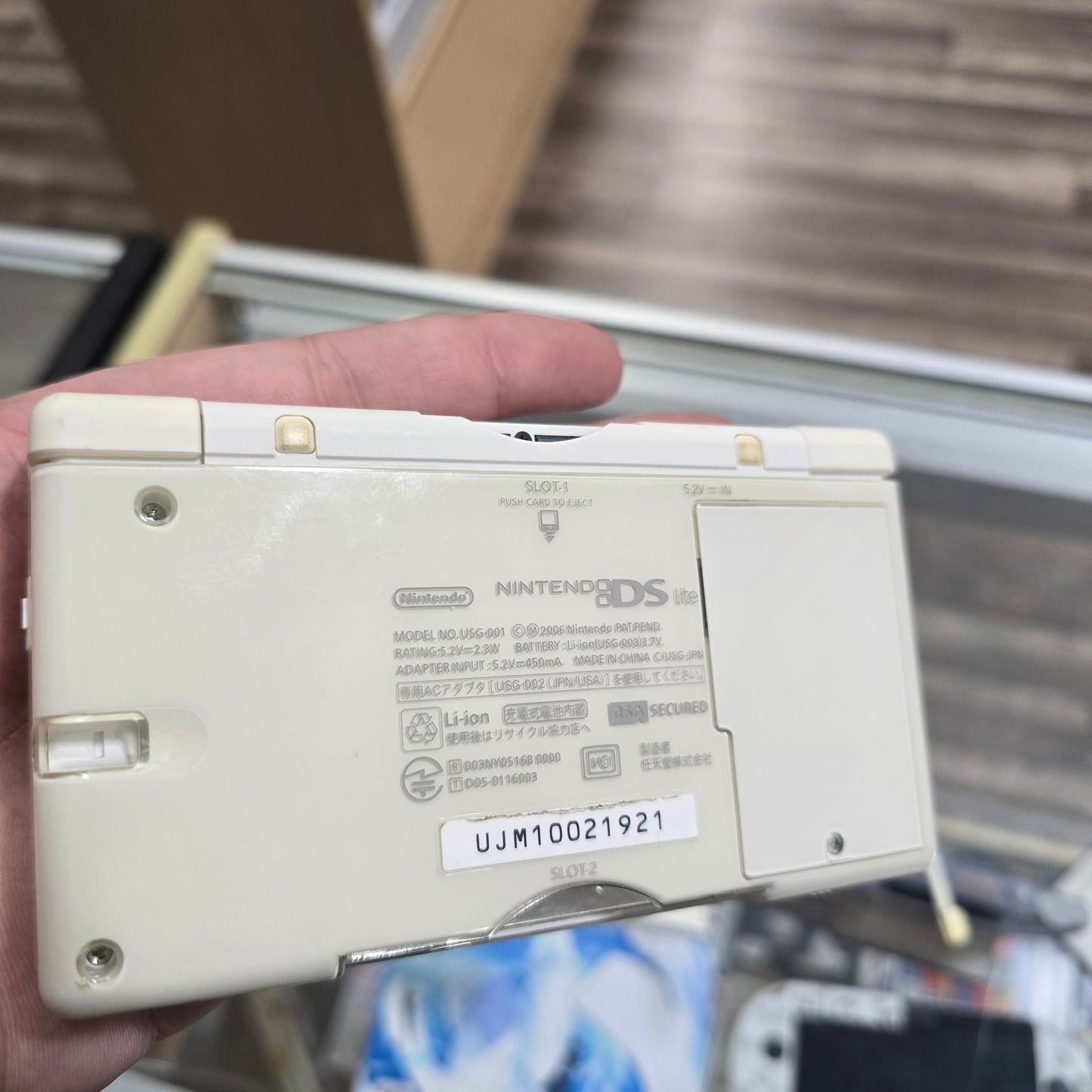 White Nintendo DS Lite Handheld System with Charger (Yellow Screen)