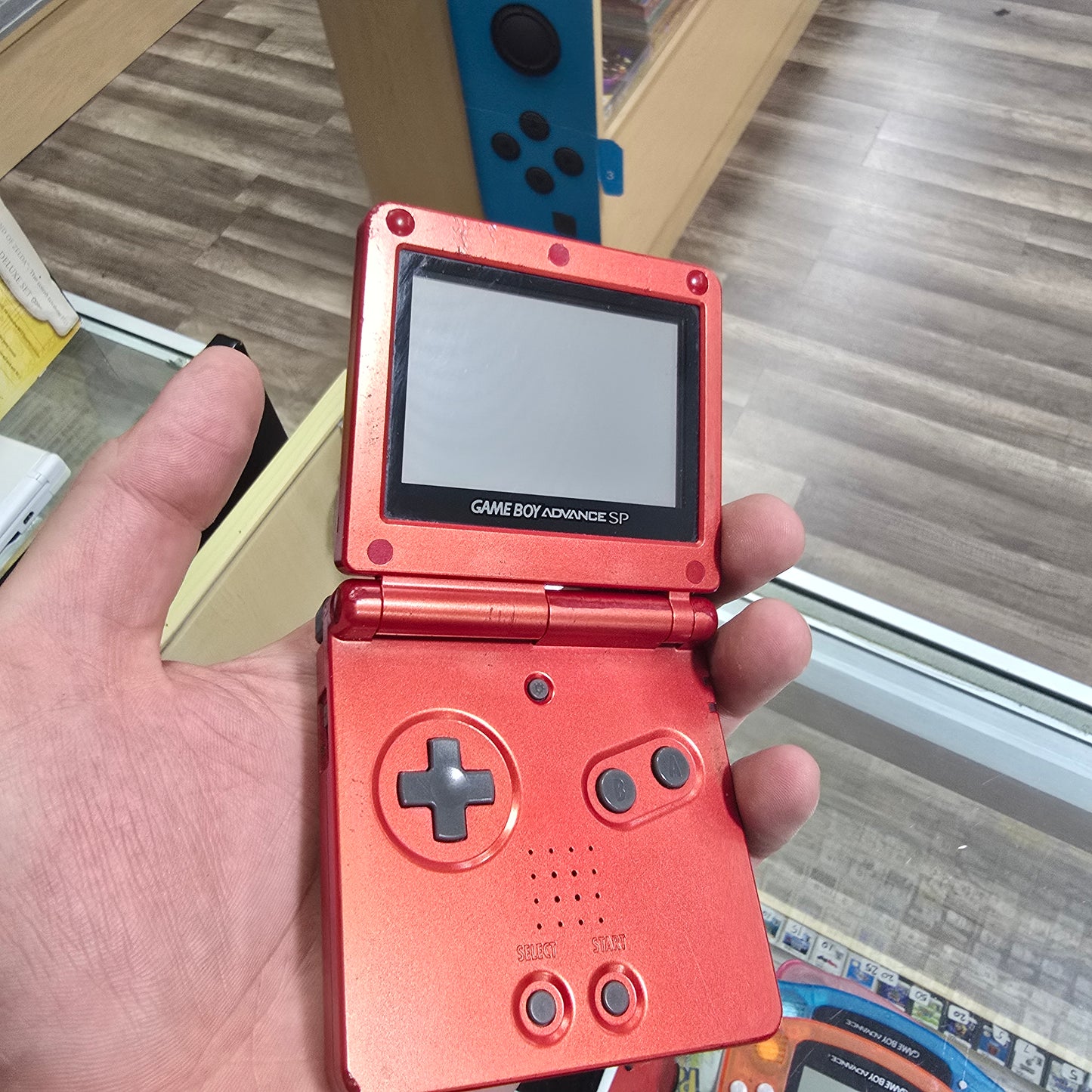 Red Nintendo Gameboy Advance SP (Rough Condition) with Charger