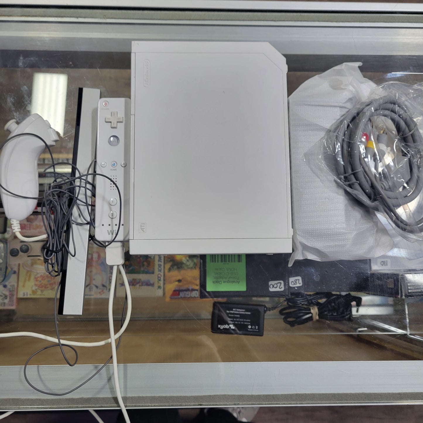 White Nintendo Wii System With (All Cables) A Controller and Nun Chuck